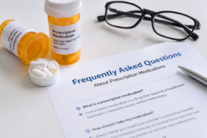 Prescription medication FAQ guide with medicine bottles and healthcare information.